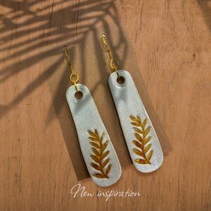 Elegant sparkly white  and gold Leaf Earrings